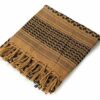 Close up of Palestine keffiyeh shemagh, tan and black pattern, folded