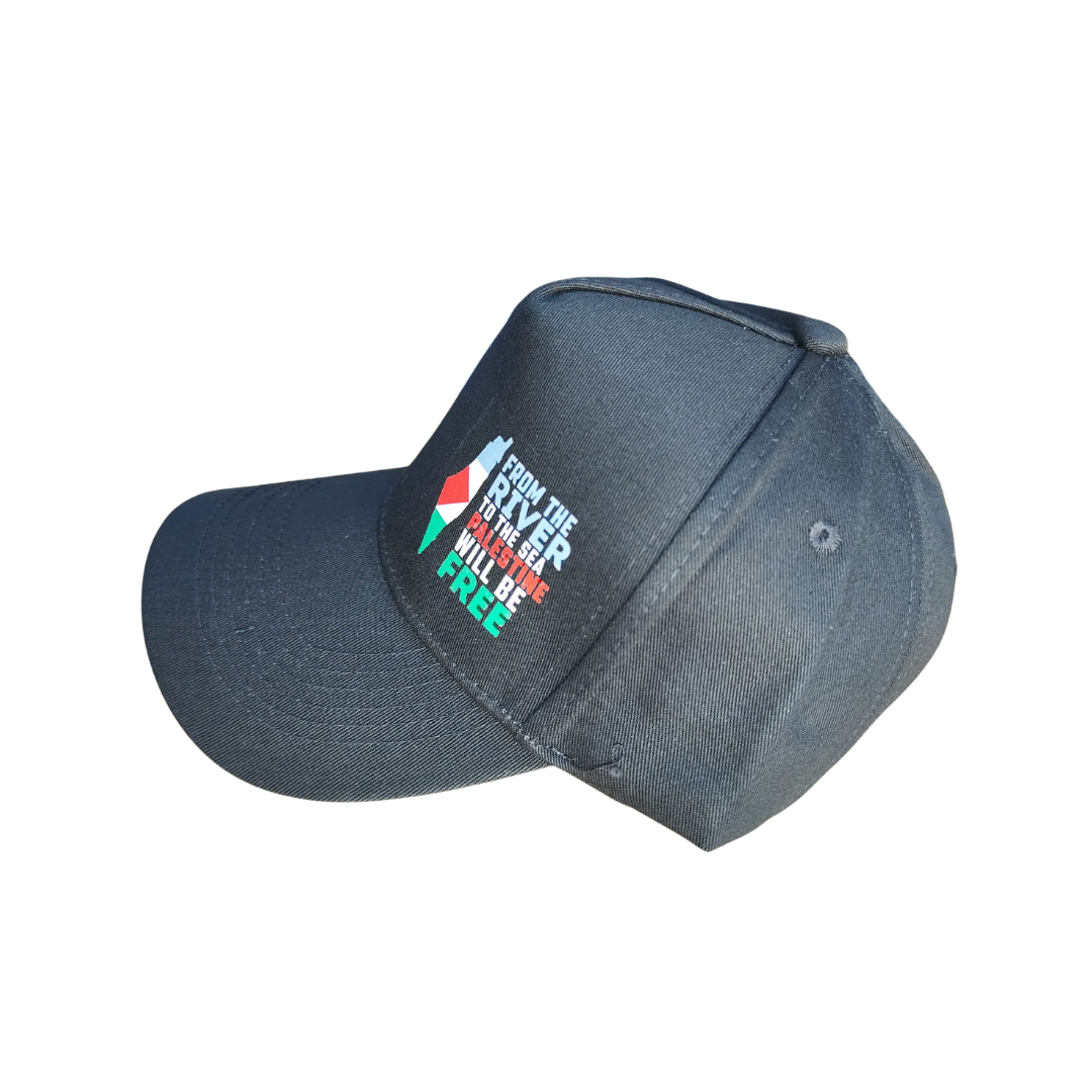 River to the Sea Palestine Larger Bolder Hat Side view of hat. The printed black baseball style hat featuring the Palestinian flag and the text "FROM THE RIVER TO THE SEA PALESTINE WILL BE FREE".