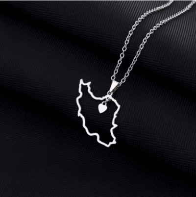 Iran Map Necklace in Silver Close up image of Iran Map Necklace in Silver, against black background