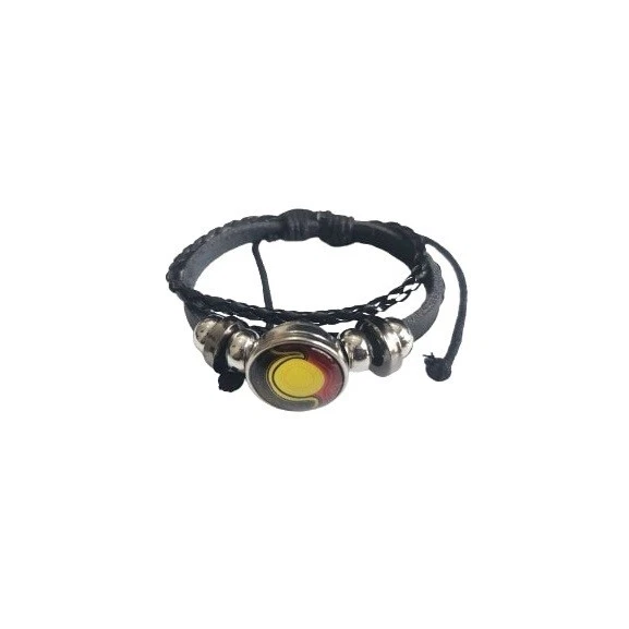 Aboriginal Hand Bracelet Black braided cord bracelet with a round metallic pendant featuring a yellow center and red accents, secured with small silver-toned beads and a small chain detail.